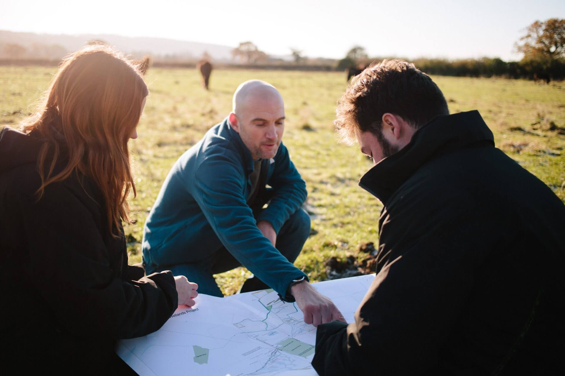 team looking at maps 