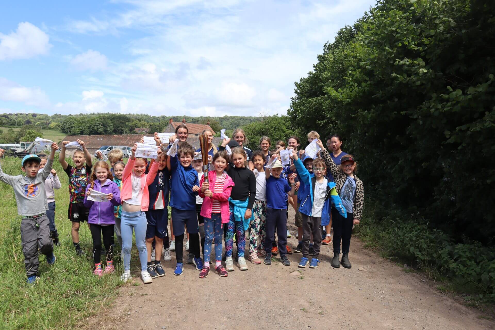 Group of children celebrating in nature