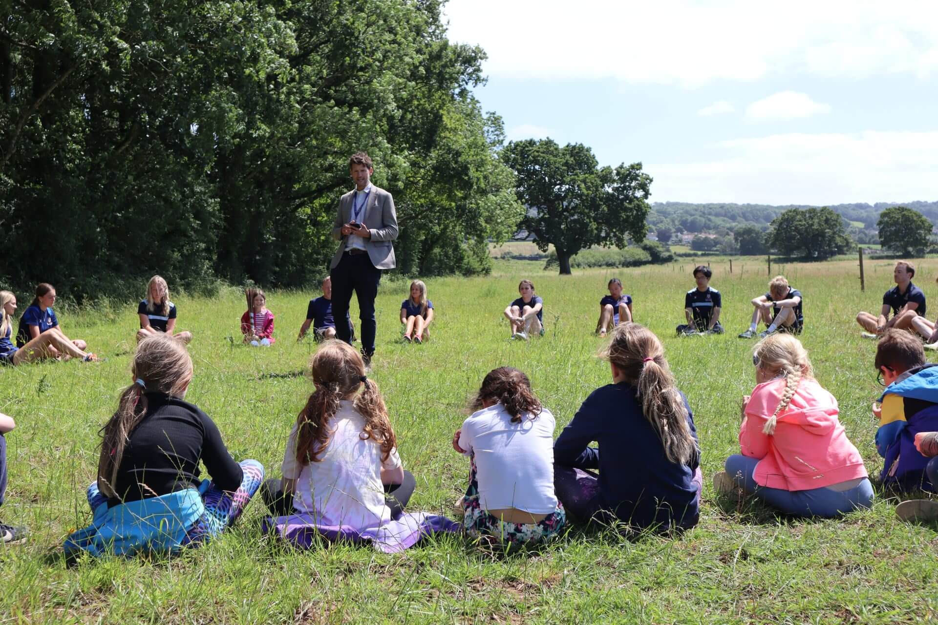 Children doing mindfulness and reconnecting with nature