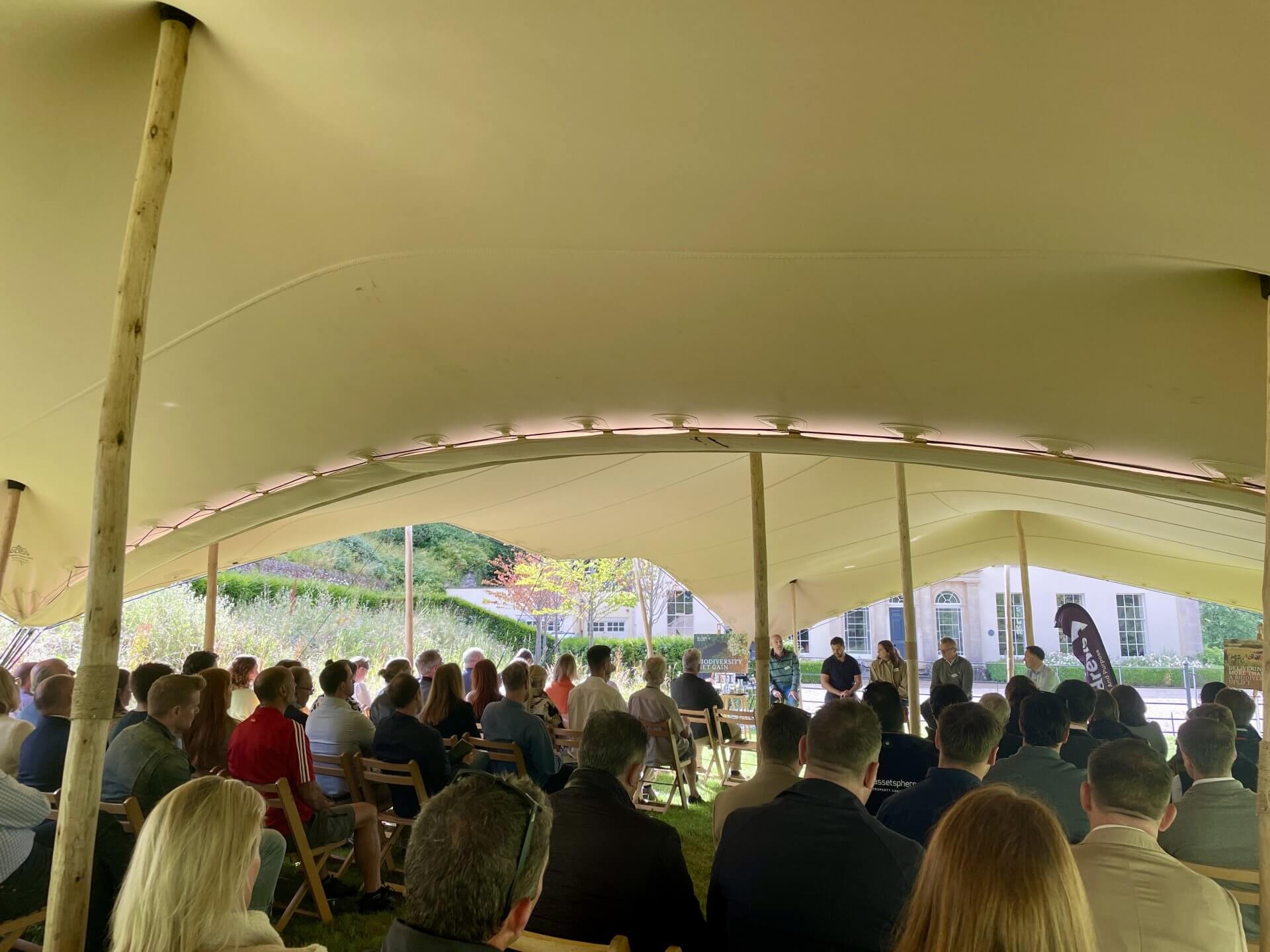 panel event under stretch tent